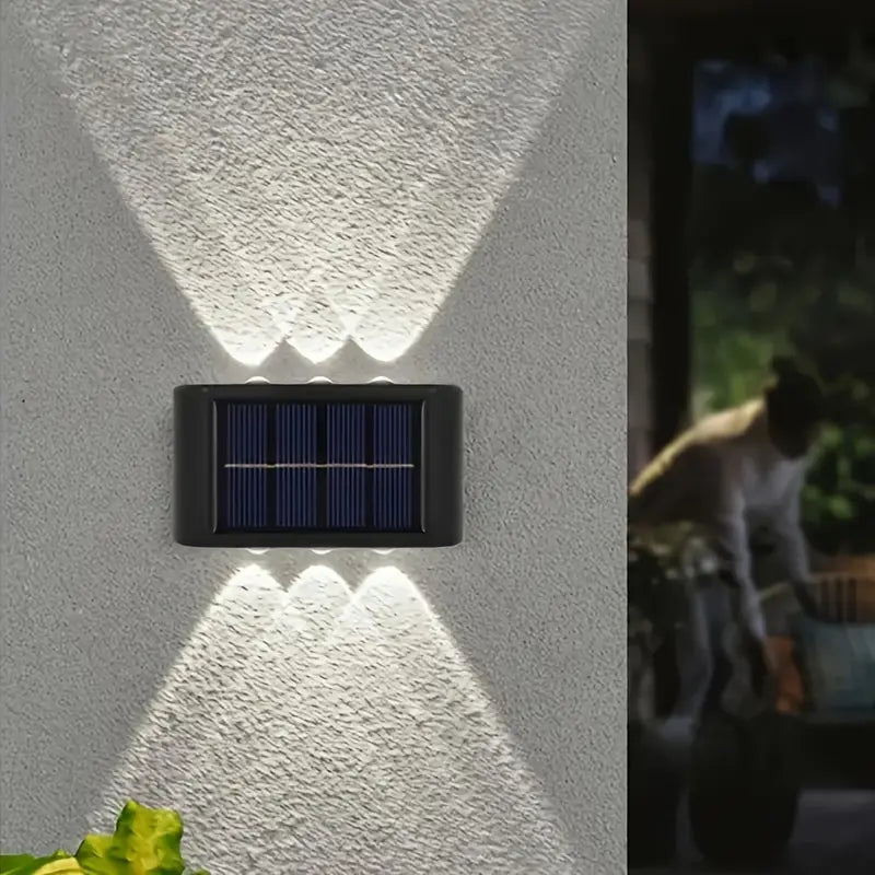 Solcellsdriven LED-utomhuslampa | Svart rostfritt stål | Modern design | För trädgård och terrass | Trådlös installation | 20 LED-lampor | Höjd 25 cm | Bredd 15 cm | Hållbar och snygg belysning