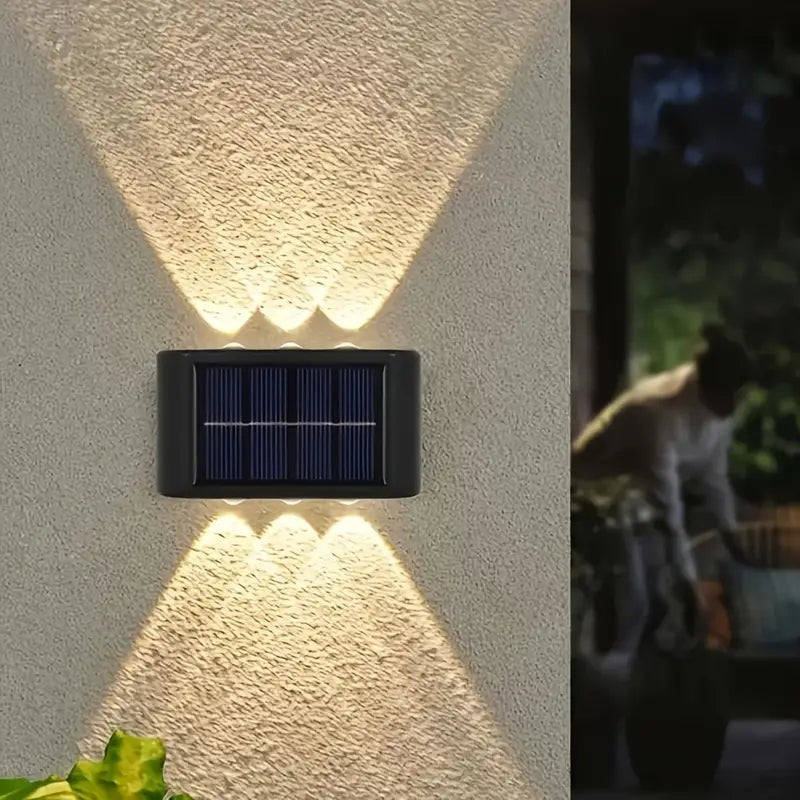 Solcellsdriven LED-utomhuslampa | Svart rostfritt stål | Modern design | För trädgård och terrass | Trådlös installation | 20 LED-lampor | Höjd 25 cm | Bredd 15 cm | Hållbar och snygg belysning