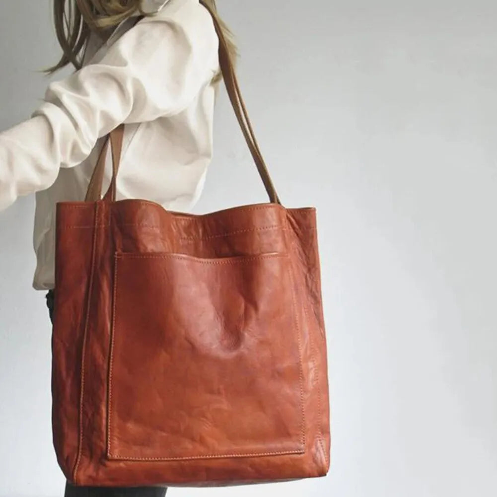 Damehåndtaske | Elegant design | Premium PU-læder | Ridsefast og pletbestandig | Vandafvisende overflade | Perfekt til daglig brug | Sofistikeret look | Style og funktionalitet |